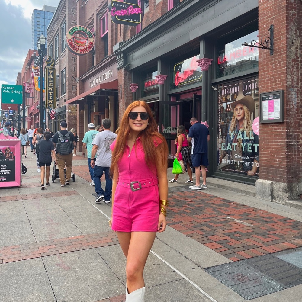 pink denim romper with belt